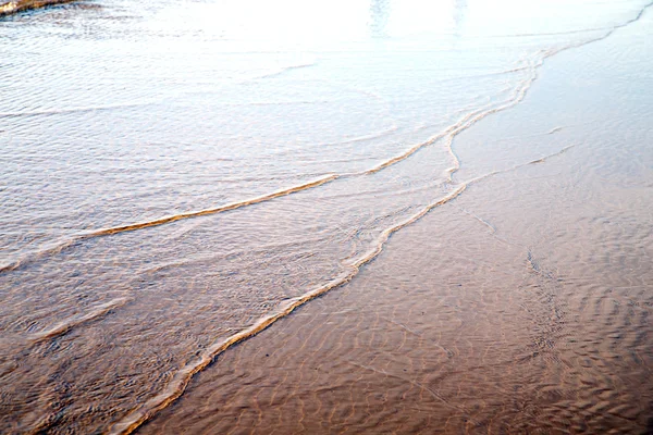 Dune morcho africa wet sand beach ocean — стоковое фото