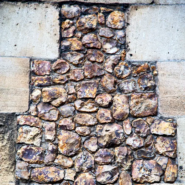 Textura de la pared en Londres Inglaterra y piedra en el suelo — Foto de Stock