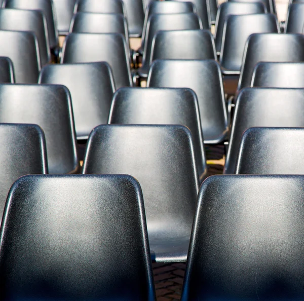 Asiento vacío en italia europa fondo negro textura —  Fotos de Stock