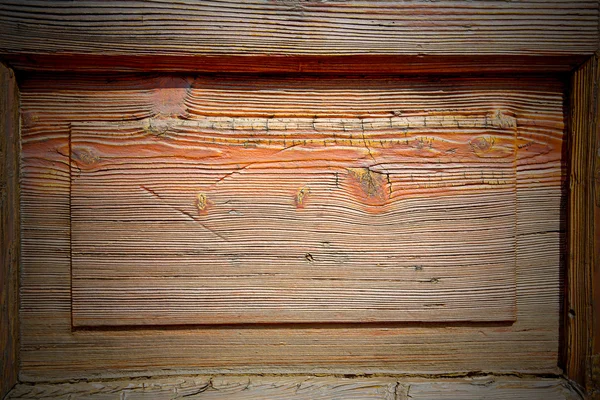 Grain texture of a brown antique wooden old door in italy   euro — Stock Photo, Image