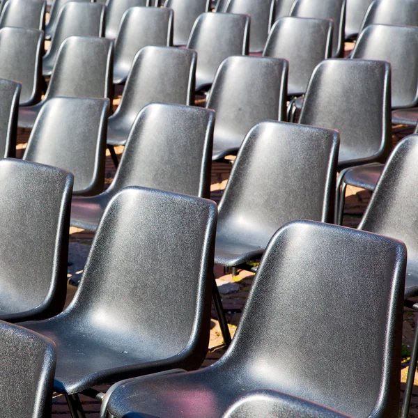 Asiento vacío en italia europa fondo negro textura —  Fotos de Stock