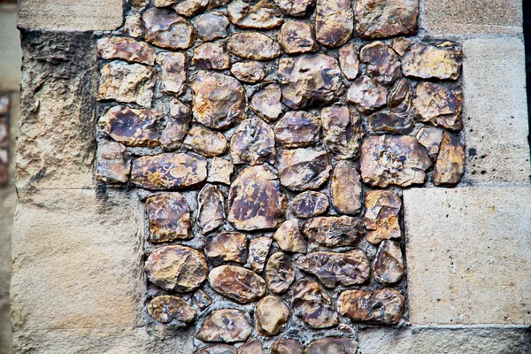 Textura de la pared en Londres Inglaterra y piedra en el suelo — Foto de Stock