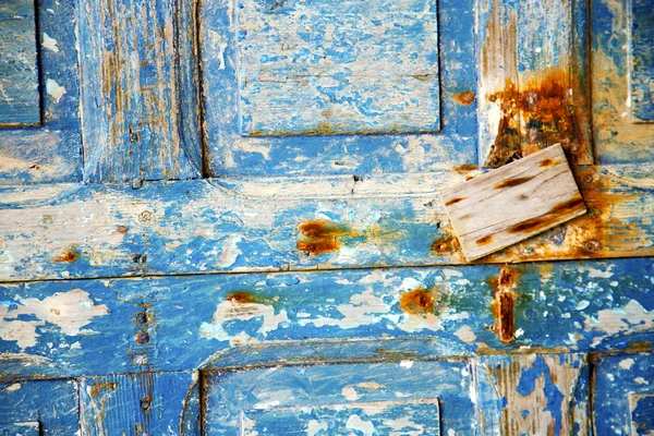Dirty stripped paint in    door and   nail — Stock Photo, Image