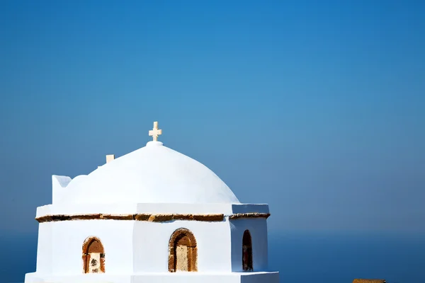 White cross  in santorini — Stock Photo, Image