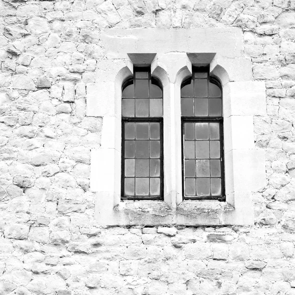 Old windon in england london brick and glass the wall — Stock Photo, Image