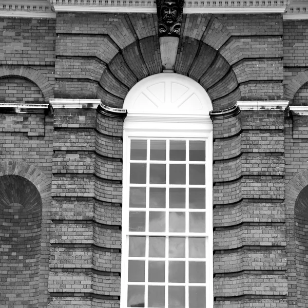window in europe london old red brick wall and      historical