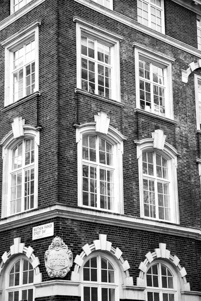 In europe london old red brick wall and    historical window — Stock Photo, Image