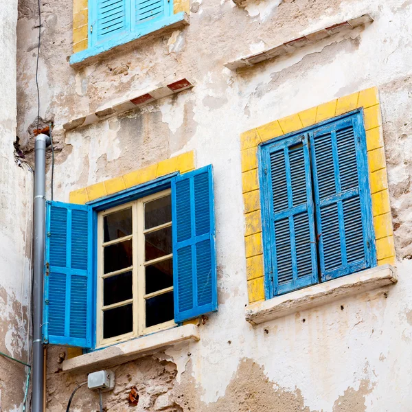 Blue window in morocco africa old construction and brown wall c — стоковое фото