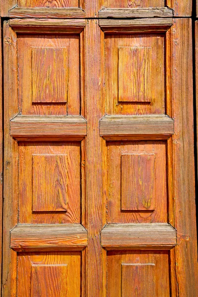 Textura de grano de una puerta vieja en italia Europa — Foto de Stock