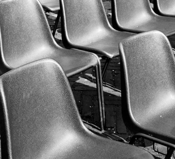 Asiento vacío en italia europa fondo negro textura —  Fotos de Stock