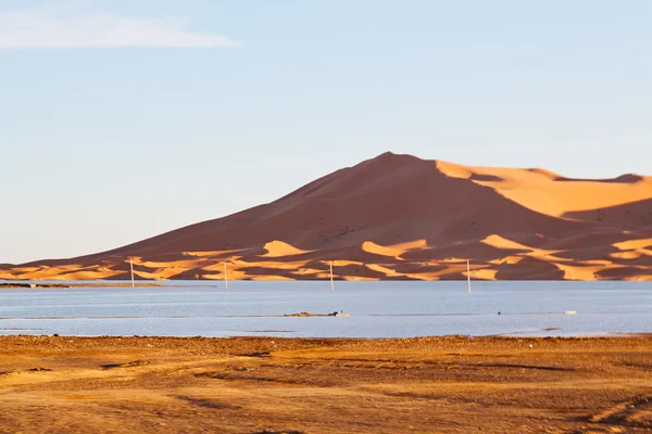 Luz do sol na duna amarela de areia de morocco do deserto — Fotografia de Stock