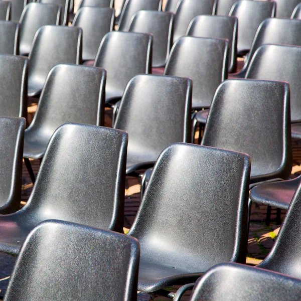 Asiento vacío en italia europa fondo negro textura —  Fotos de Stock