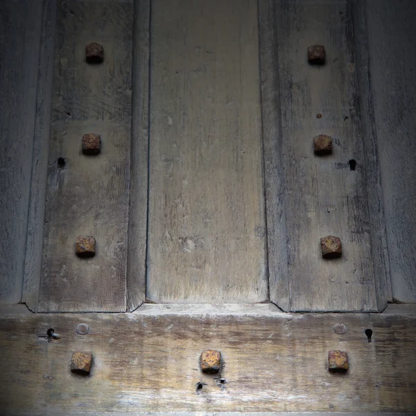 In london antique brown door  rusty  brass nail and light — Stock Photo, Image