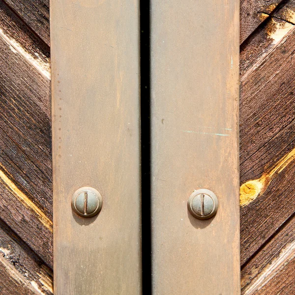 Stripped paint  door    in italy   ancian wood and traditional — Stock Photo, Image