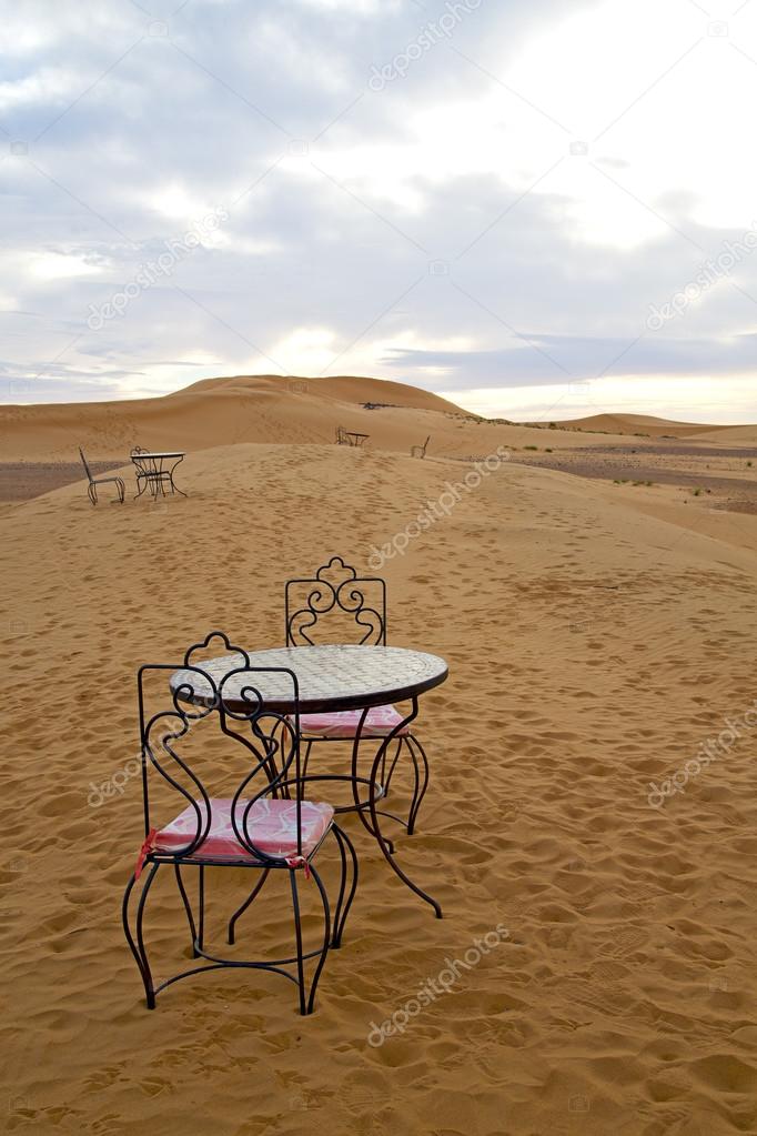 table and seat  desert    morocco    africa yellow sand