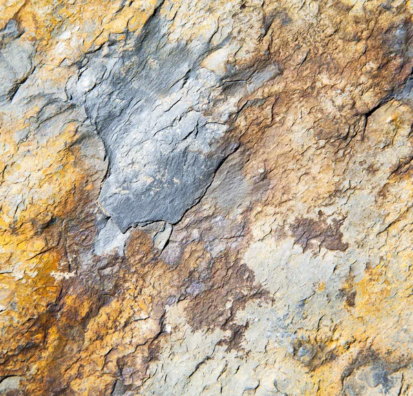 Rochers pierre et rouge gneiss orange dans le mur du Maroc — Photo