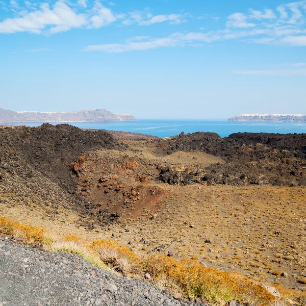 Vulkanische grond in Europa santorini Griekenland hemel en mediterrane s — Stockfoto