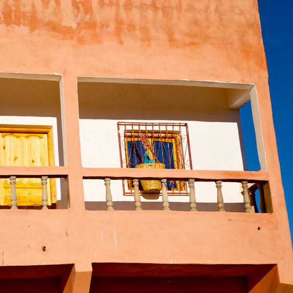 Blue window in morocco africa old construction and brown wall construction