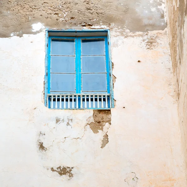Blue window in morocco africa old construction and brown wall  c — Stock Photo, Image