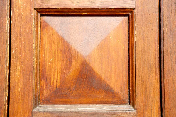 Abstrakta konsistens av en gammal dörr i Italien — Stockfoto