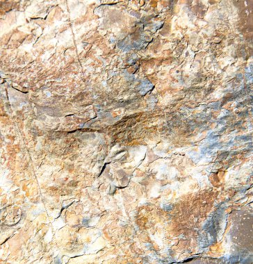 Taş taş ve Fas duvarında kırmızı turuncu gnays