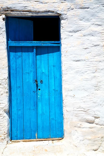 Blå dörren i antika byn santorini — Stockfoto