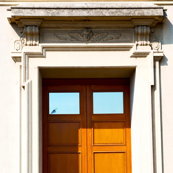 Detail in  wall door  italy land europe architecture and wood th — Stock Photo, Image