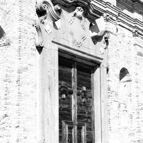 Detail in muur deur Italië land Europa architectuur en hout th — Stockfoto