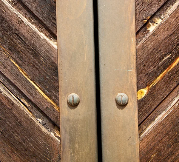 Stripped paint  door    in italy   ancian wood and traditional — Stock Photo, Image