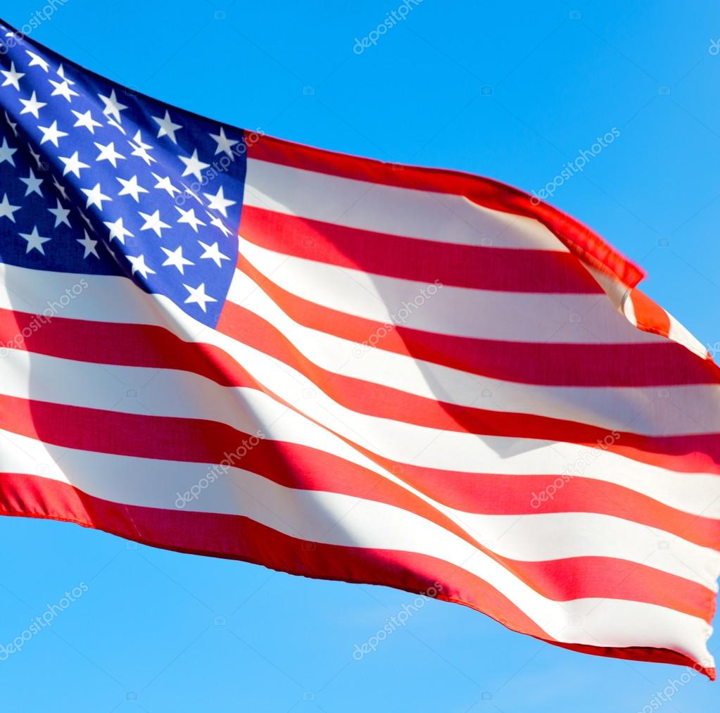 usa waving flag in the blue sky bcolour and wave