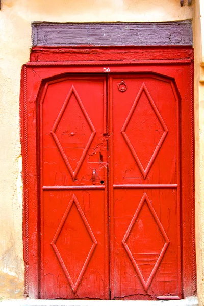 Mármore histórico no edifício antigo vermelho — Fotografia de Stock