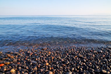 kıyı şeridi gündoğumu taş  