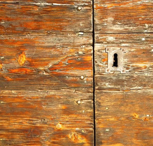 Abstract  house  door     in italy  lombardy   column  the red r — Stock Photo, Image