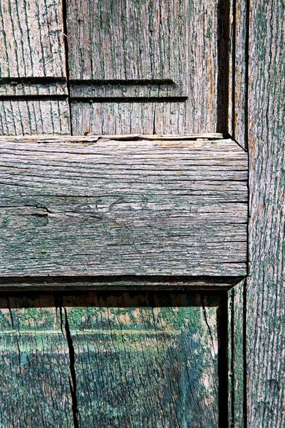 Grüne Stück aus Wolle braune Klopfer und Holz Tür cairate vares — Stockfoto