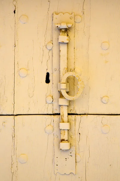 Abstract cross   wood door  tradate   italy — Stock Photo, Image