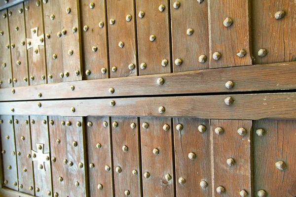 Sfocatura seprio astratto ottone arrugginito chiuso legno italia croce — Foto Stock
