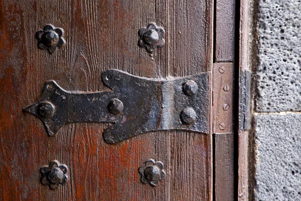 Castle  spain knocker  abstract r wood in the red brown — Stock Photo, Image