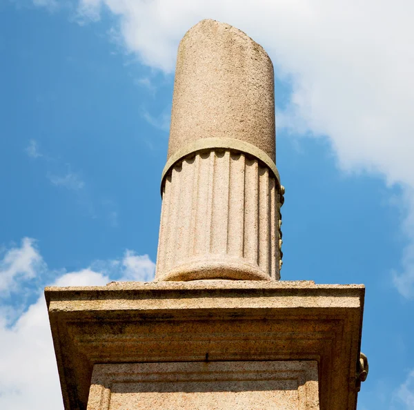 Old column in the cloudy sky of europe italy — Stock Photo, Image