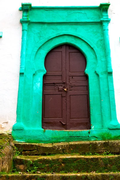 Old door in morocco africa ancien and wall ornate green — Stock Photo, Image