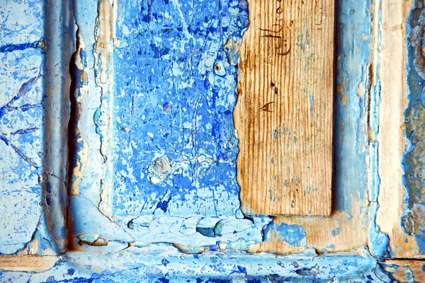 Dirty   paint in   blue wood  rusty nail — Stock Photo, Image