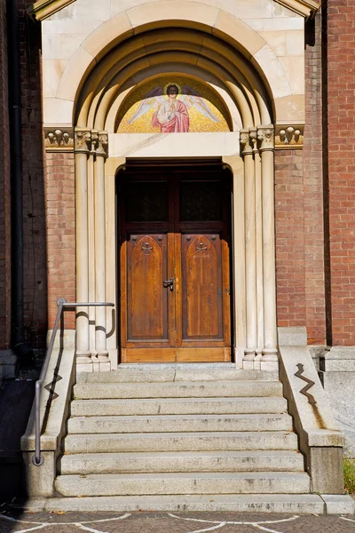 Dveře v Itálii lombardský sloupek anděl — Stock fotografie