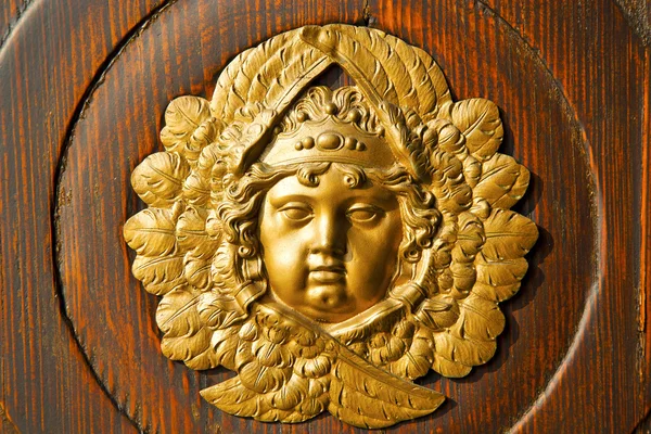 Gold face  house  door     in italy  lombardy   column — Stock Photo, Image