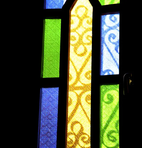 Colorated glass and sun in morocco africa window and light — Stock Photo, Image