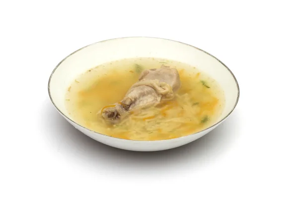 Куриный суп на белом фоне — стоковое фото
