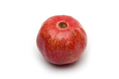 beyaz zemin üzerine nar