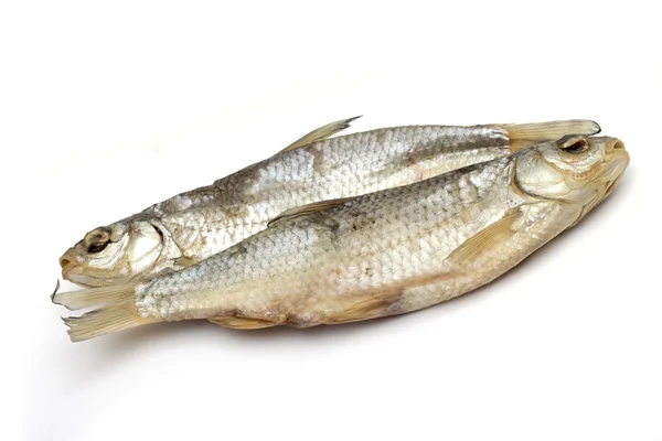 Pescado seco sobre fondo blanco — Foto de Stock