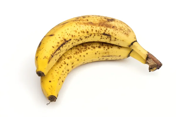 Bananen op de witte achtergrond — Stockfoto