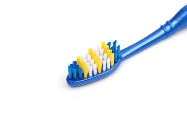 Toothbrush on the white background — Stock Photo, Image