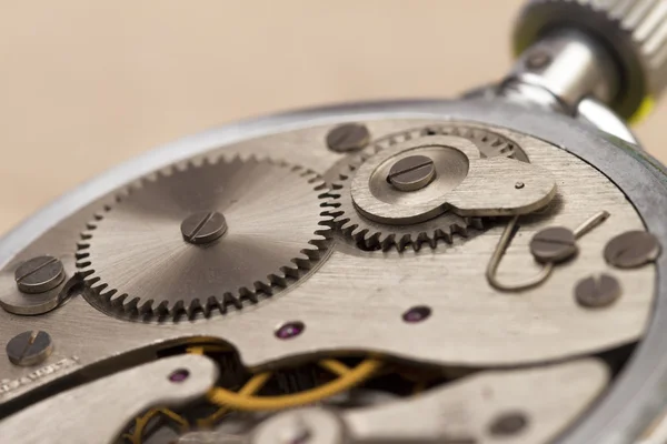 Mecanismo de reloj en el fondo blanco — Foto de Stock