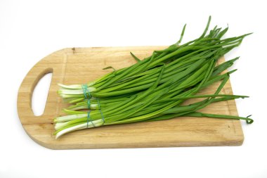 green onions on the white background clipart